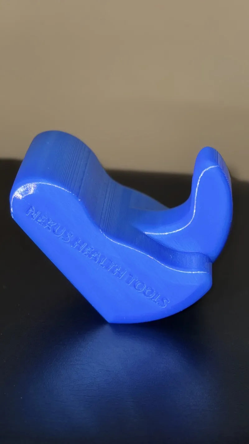 Core Nexus psoas and iliacus release tool — engineered with dual muscle-specific tips for targeted hip flexor release