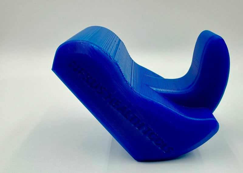 Core Nexus psoas and iliacus release tool in blue — compact enough for a gym bag, engineered for athletic use